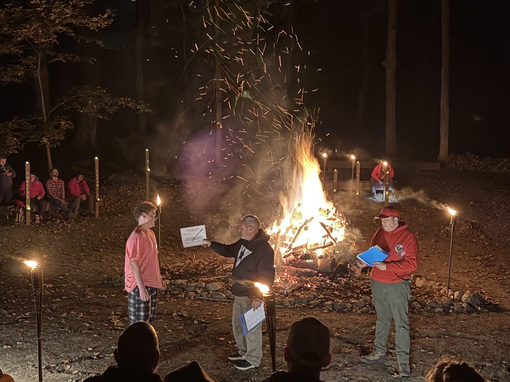 Kaden reciving his Archery Champion certificate, suitable for framing.