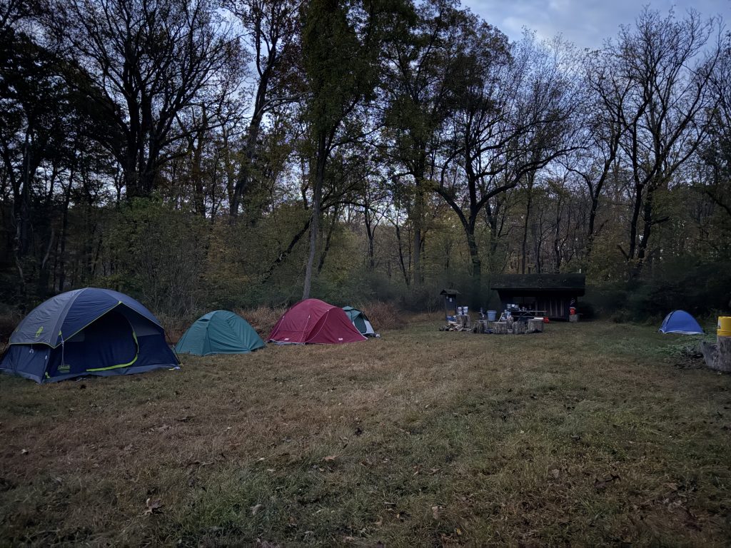 Sunday morning, cold camp, sleeping Scouts
