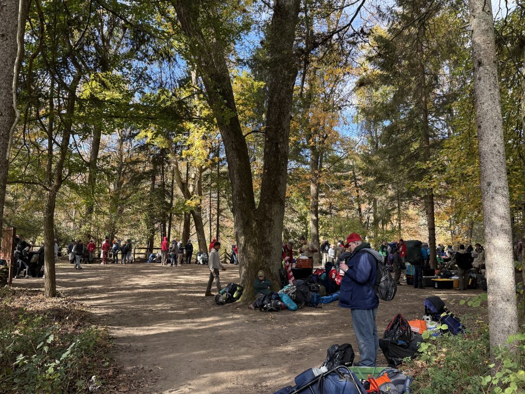 Assistant Scoutmaster Don guarding our gear as we stage for departure with the other units.